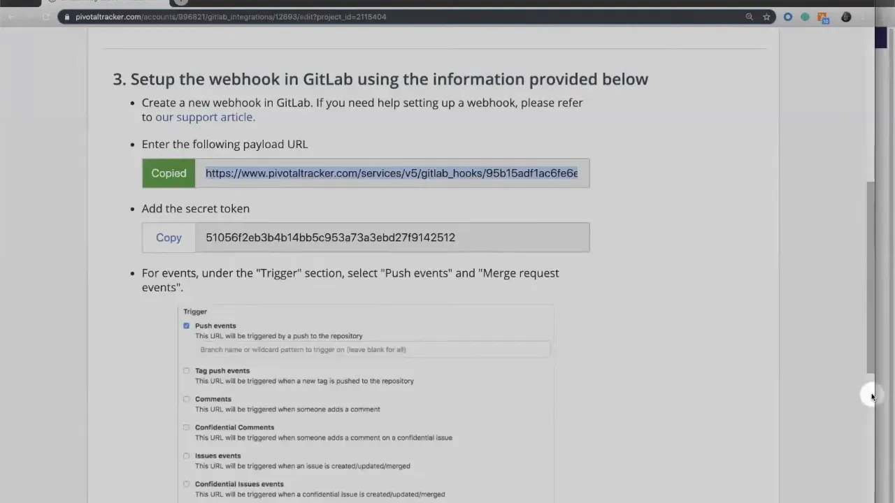 Tracker integration page showing the payload URL marked as copied and the secret token visible for copying.